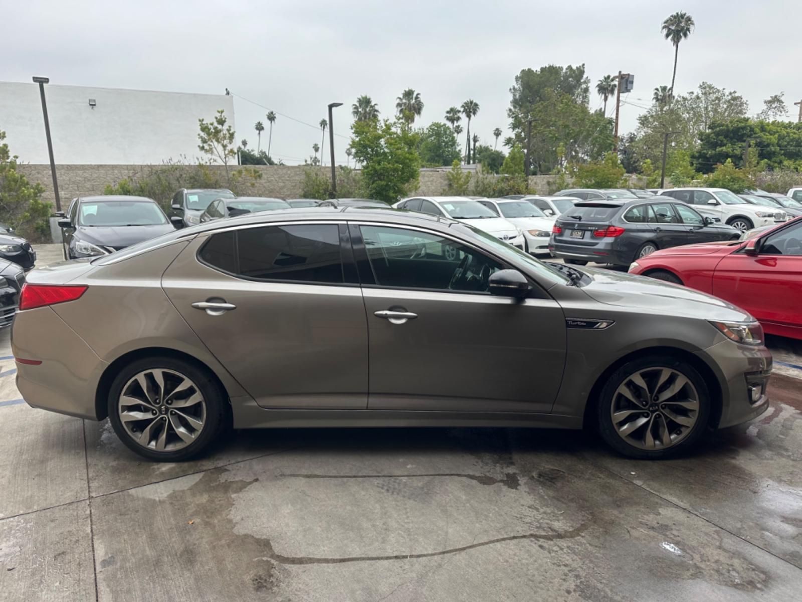 2014 Gray /BLACK Kia Optima SX Turbo (5XXGR4A62EG) with an 2.0L L4 DOHC 16V TURBO engine, 6-Speed Automatic transmission, located at 30 S. Berkeley Avenue, Pasadena, CA, 91107, (626) 248-7567, 34.145447, -118.109398 - New tires! Moon Roof! Nice Interior! Looks and drives good! Bad credit? We can help! We are the bank. All our cars are thoroughly inspected and reconditioned by our technicians. FREE CARFAX report. Stop by or call to speak with our friendly staff. Whether you have bad credit, no credit, bankruptcy, - Photo #5